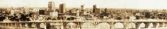 The Dallas skyline behind the Oak Cliff viaduct in 1912... click to see Dallas photos at the Library of Congress