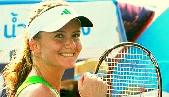 Ana Ivanovic of Serbia reacts after she scores against Elena Dementieva of  Russia during the quarter final of the Dubai Duty Free Women's Tennis Open  2008 in Dubai, United Arab Emirates,Thursday Feb.