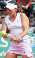 Martina launching a backhand to Maria Kirilenko on May 1